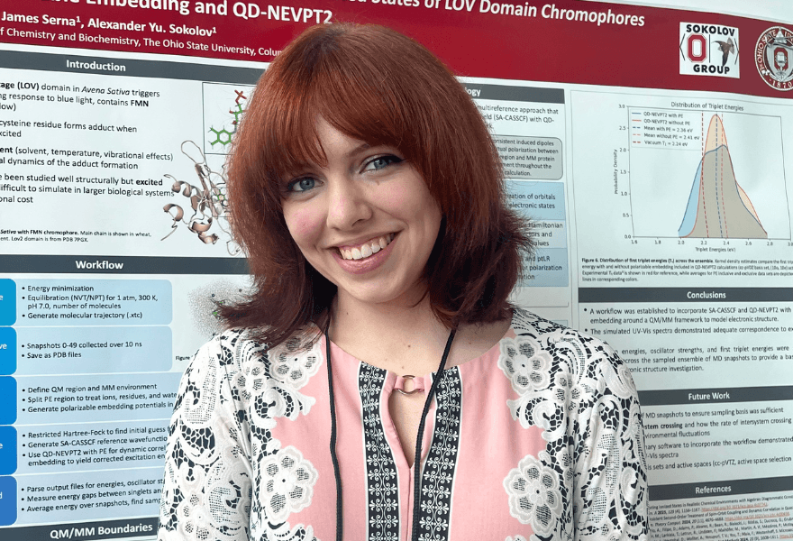Choe Jones in front of her poster presentation