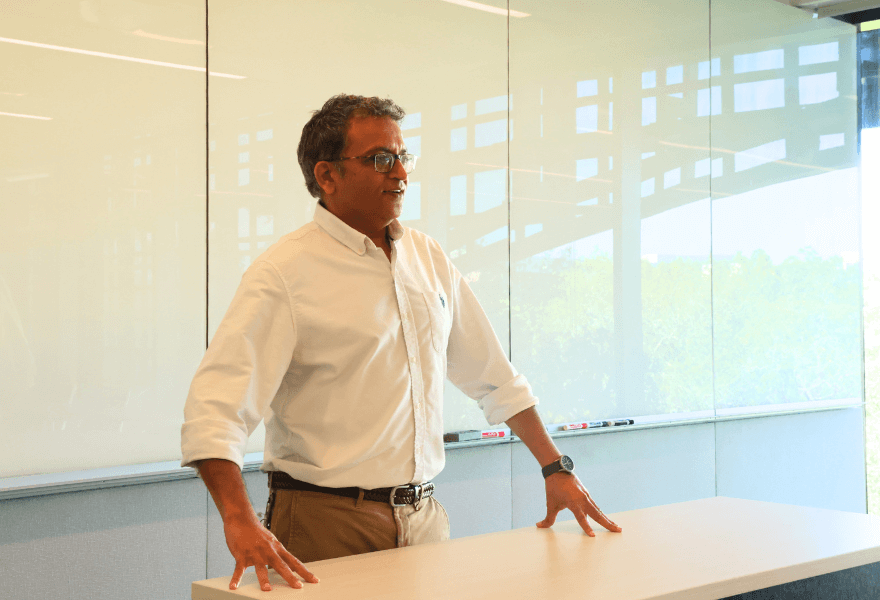 Deepak Singh at the front of an Honors College classroom
