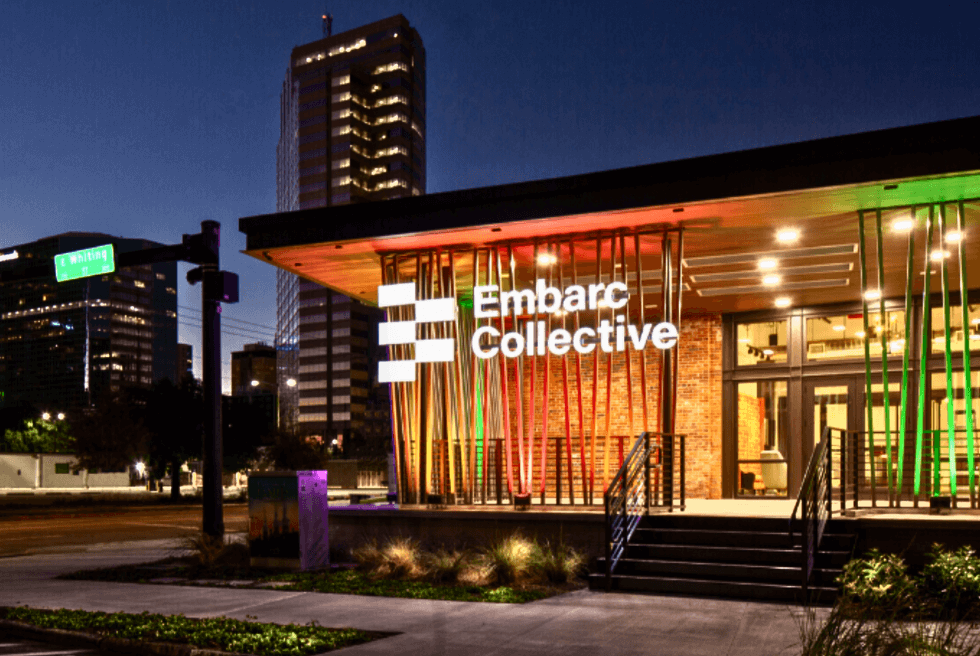 Embarc Collective logo outside building