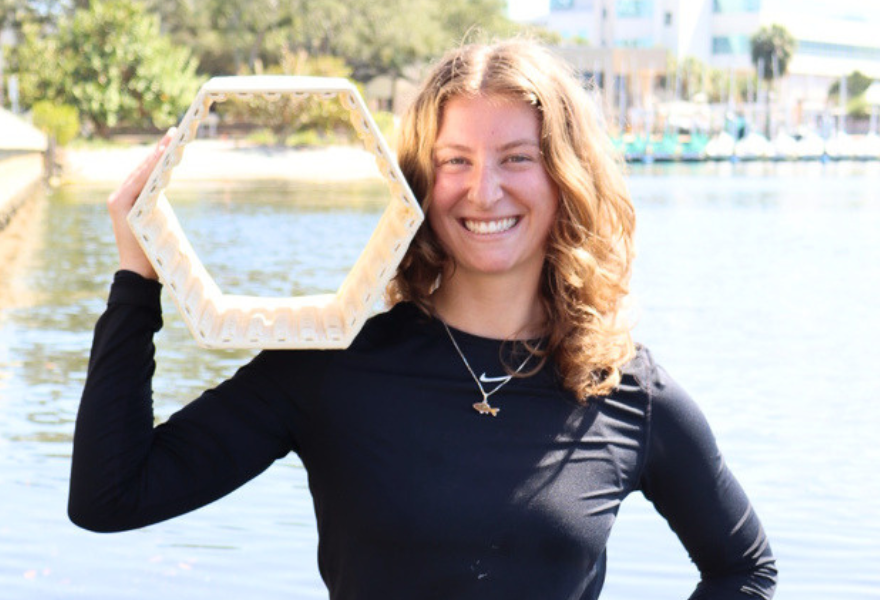 Lily Boyer in water with oyster brick