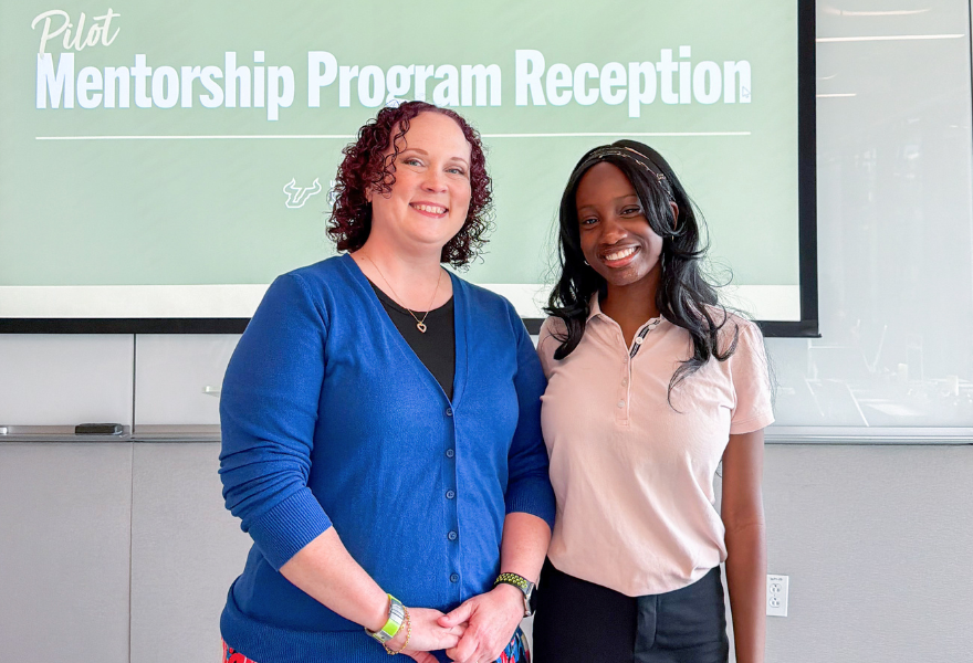 Stephanie Anspaugh-Naples (mentor) and Oluwasindara Kehinde (mentee) at pilot mentorship program reception