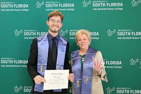 Matheus Ivanesciuc and Rhea Law at his Phi Beta Kappa induction ceremony