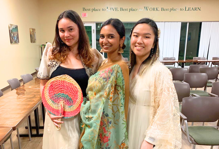 Naziza Naeer Bhiyuan in cultural attire with two other Honors students in the Juniper and Poplar dormitory.