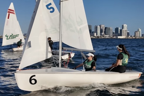 Sailing captain Madisen Hamai in her sailboat, out on the water.