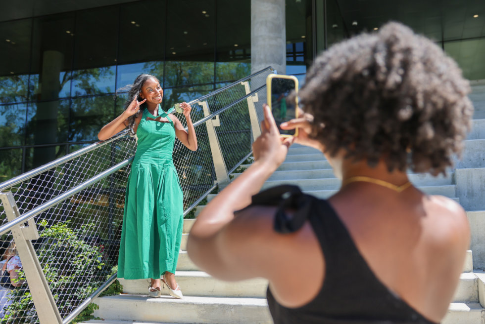 Friend takes photo of Honors graduate
