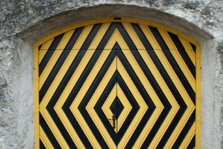 doors with black and yellow warning