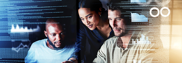 3 people looking at computer with techy overlay