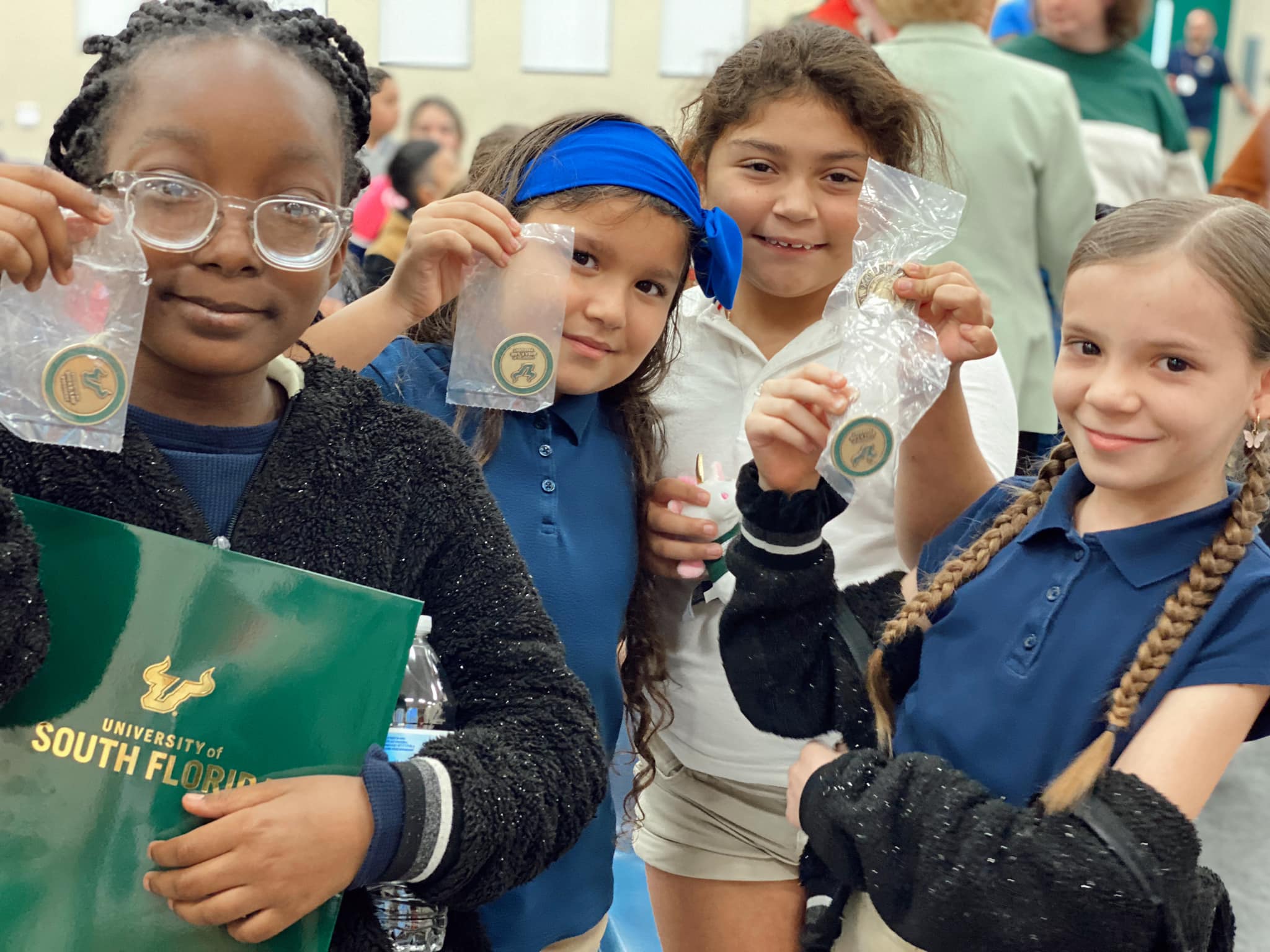 Students with USF Branded materials