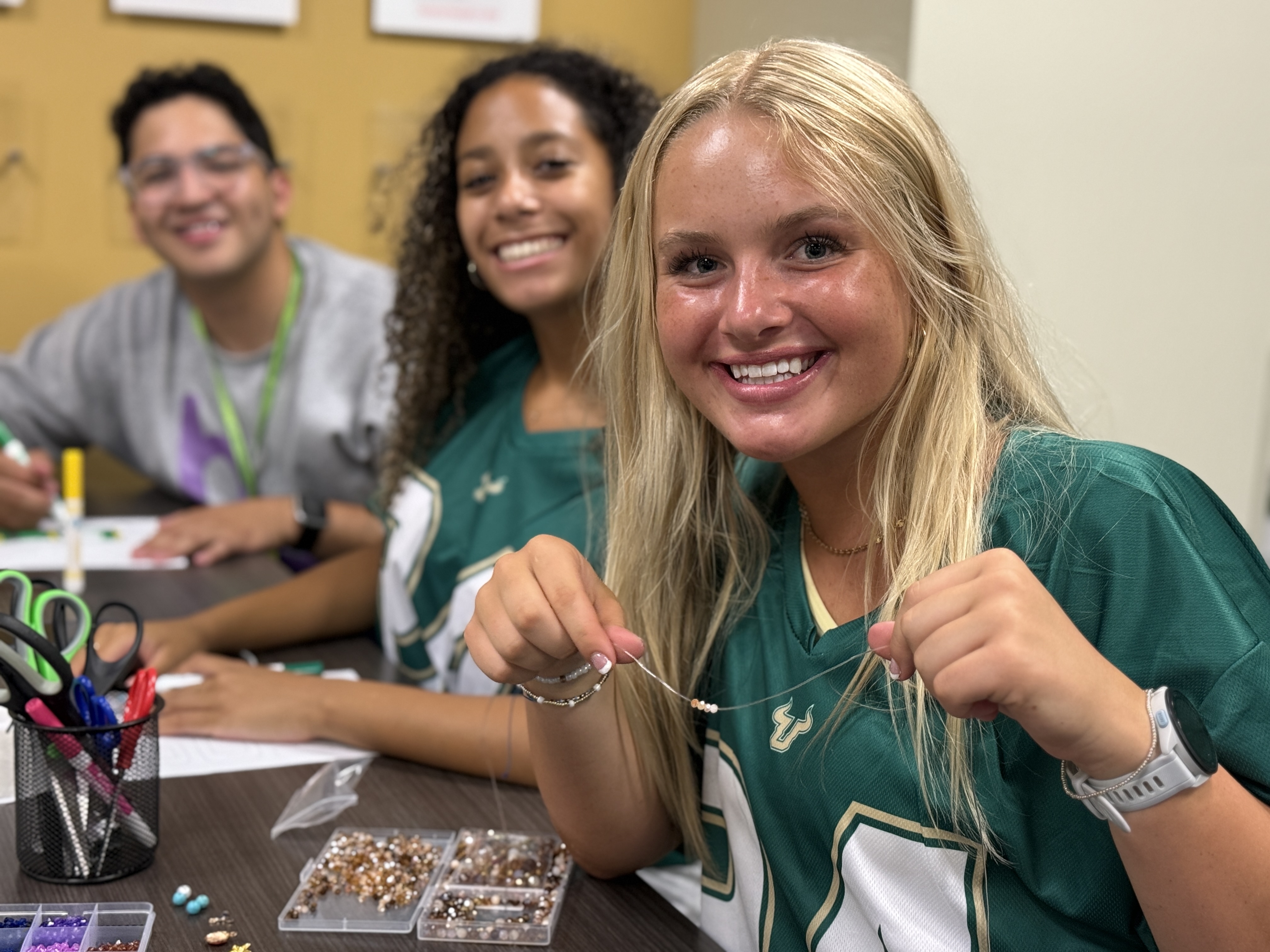 Rocky's Residents students make friendship bracelets at the Marshall Student Center