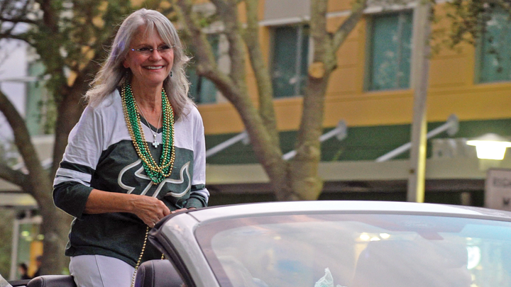 Dr. Sylvia Campbell serves as grand marshal of the Running with the Bulls Homecoming Parade in 2018