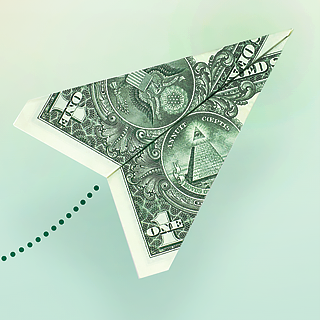 Dollar bill shaped like a paper plane