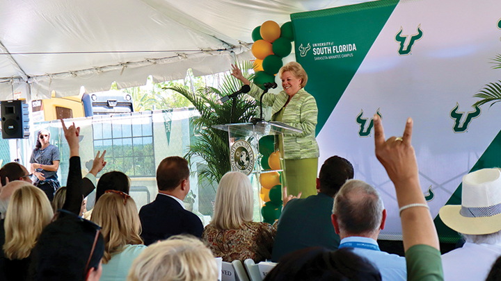 2:30 p.m. Wednesday, Law speaking at a podium to a crowd as the USF Sarasota-Manatee campus breaks ground on its first student center and residence hall.