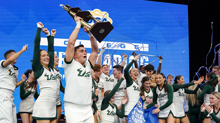 USF’s Coed Cheer team celebrates its third consecutive national championship at the Universal Cheerleading Association College Nationals in January