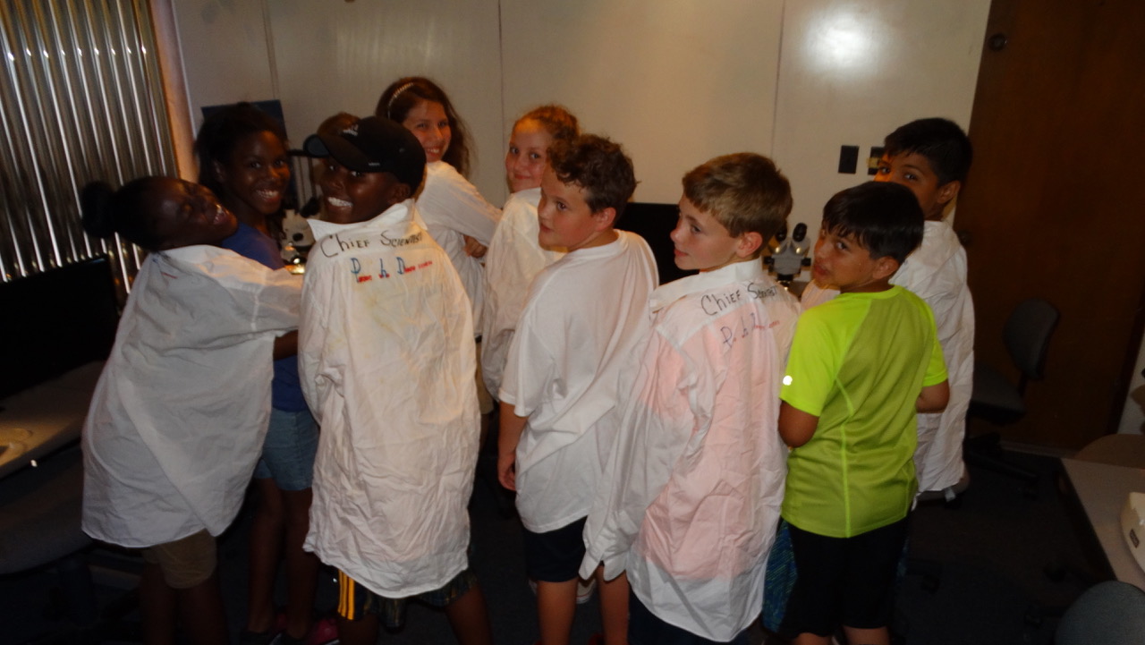 Elementary scholars in lab coats.