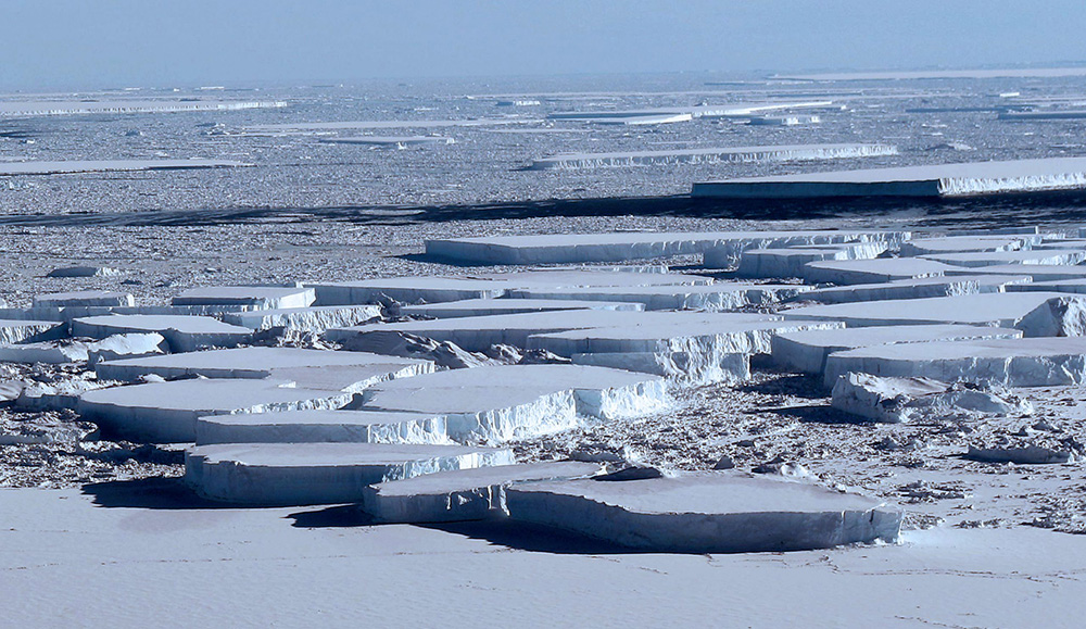 Large tabular icebergs located between Antarctica's Larsen C ice shelf and the A-68 ice island, which calved off of the Larsen C last year, as seen on a NASA Operation IceBridge mission on Oct. 16, 2018. (NASA/Jefferson Beck) 