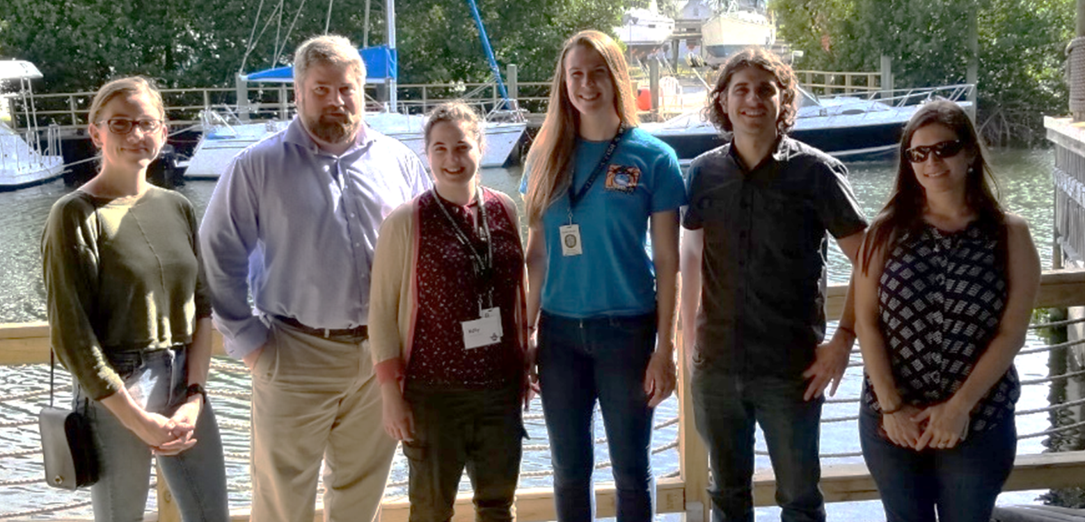 Recent graduate students.  Left to right: Beatre Combs-Hintze, Cameron Ainsworth, Kelly Vasbinder, Becky Scott, Michael Drexer, Michelle Masi.