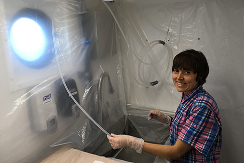 Lead author Adrienne Hollister aboard the R/V Hogarth in 2018. A key challenge for scientists working on trace metals is contamination, especially aboard a research ship, so clean lab techniques are required.