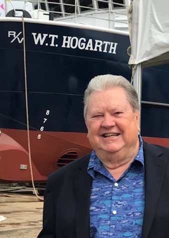 Dr. William Hogarth in front of the Florida Institute of Oceanography’s research vessel named in his honor.