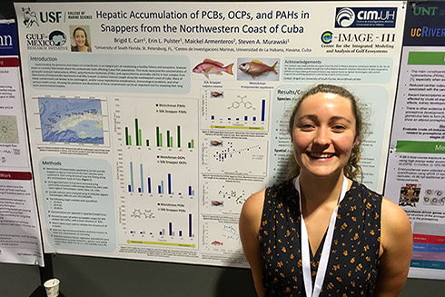 Brigid Carr presenting her poster during the Tuesday evening poster session of GoMOSES.