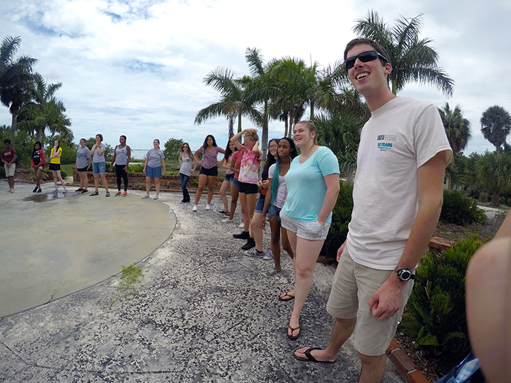 Campers and staff having fun with a team-building exercise