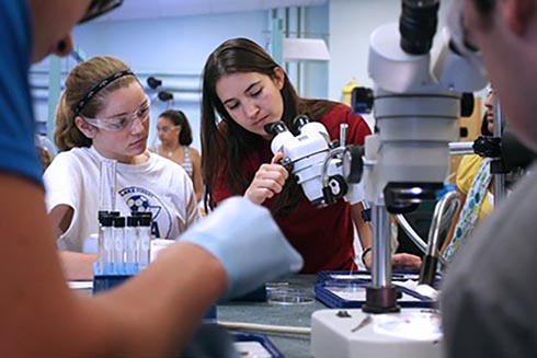 USF CMS alumna Dr. Christin Murphy at an outreach event while a graduate student at the college.