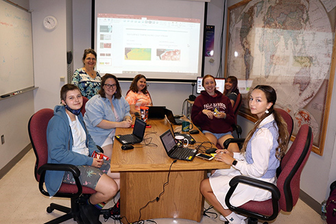 Peer counselor Lauren, Lab Leaders Savannah and Dr. Digna, and campers Savannah, Sarah, Megan, and Alana help create a final presentation showing sea surface temperature and eddies that formed in the Gulf of Mexico and along the Gulf Stream from July 2020 – July 2021.