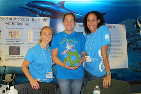 Drs Erin Symonds, Mya Breitbart and Karyna Rosario at their ‘World of Microbes’ station as part of the St. Petersburg Science Festival.