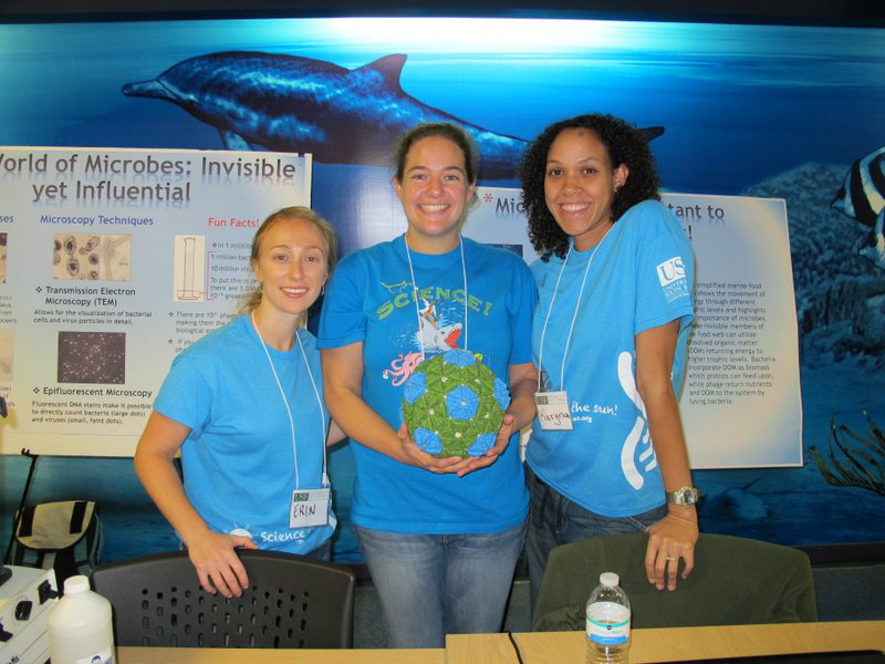 Drs Erin Symonds, Mya Breitbart and Karyna Rosario at their ‘World of Microbes’ station as part of the St. Petersburg Science Festival.