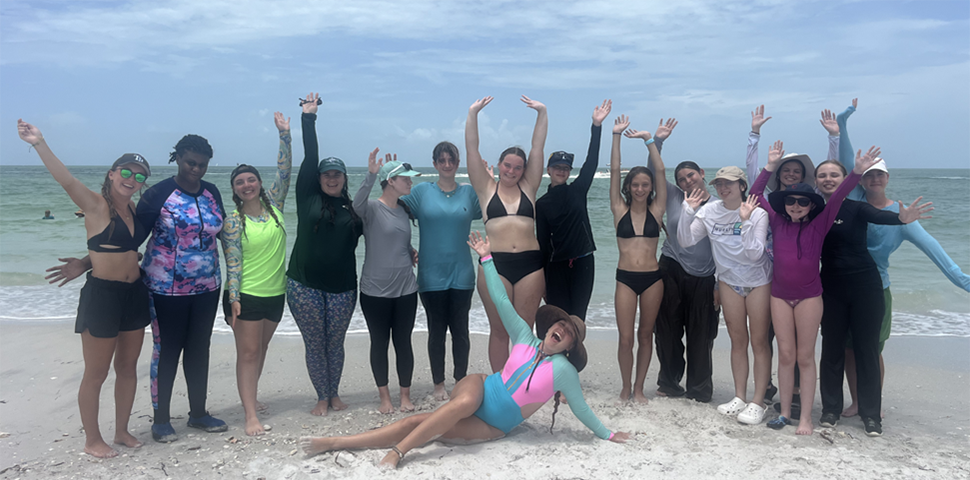 Group photo of campers, peers, and staff while at Shell Key.