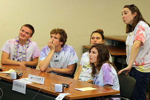 Members of the Seminole High School ‘A team’ review their answers during a break in the action of the Round Robin morning session at the 2019 Spoonbill Bowl. 