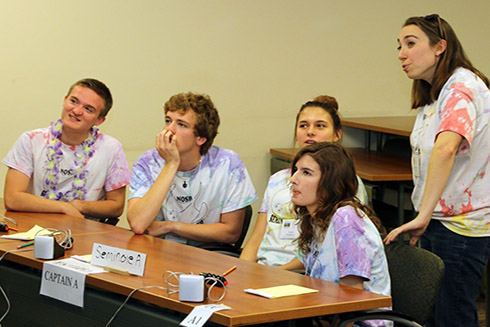 Members of the Seminole High School ‘A team’ review their answers during a break in the action of the Round Robin morning session at the 2019 Spoonbill Bowl.