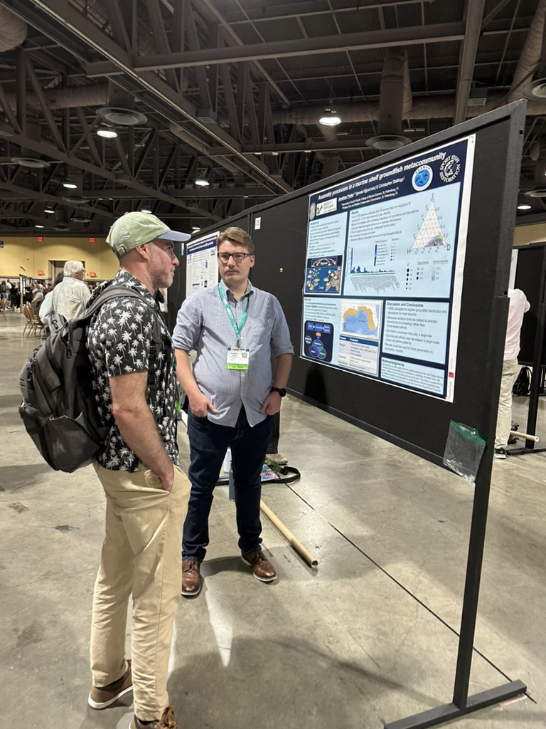 Another CMS doctoral candidate, Jon Peake, presents his research in the newly minted coastal and marine ecology poster session.  