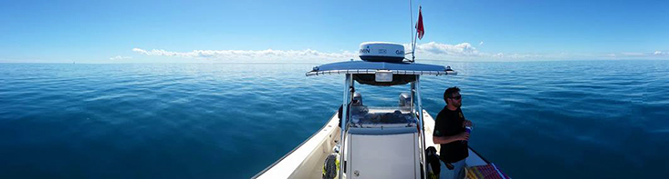 Joshua Kilborn, PhD, on watch offshore Tampa Bay while divers conduct fish surveys for the Fish Ecology Lab.