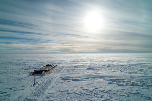 A perpetually dark landscape of lakes and rivers exists underneath Antarctica’s thick glacial blanket. Photo Credit: J. T. Thomas