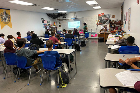 Ph.D. student Natalia Lopez, dicussing her undergraduate research using stable isotopes to predict the impacts of sea level rise in a natural reserve in Puerto Rico.