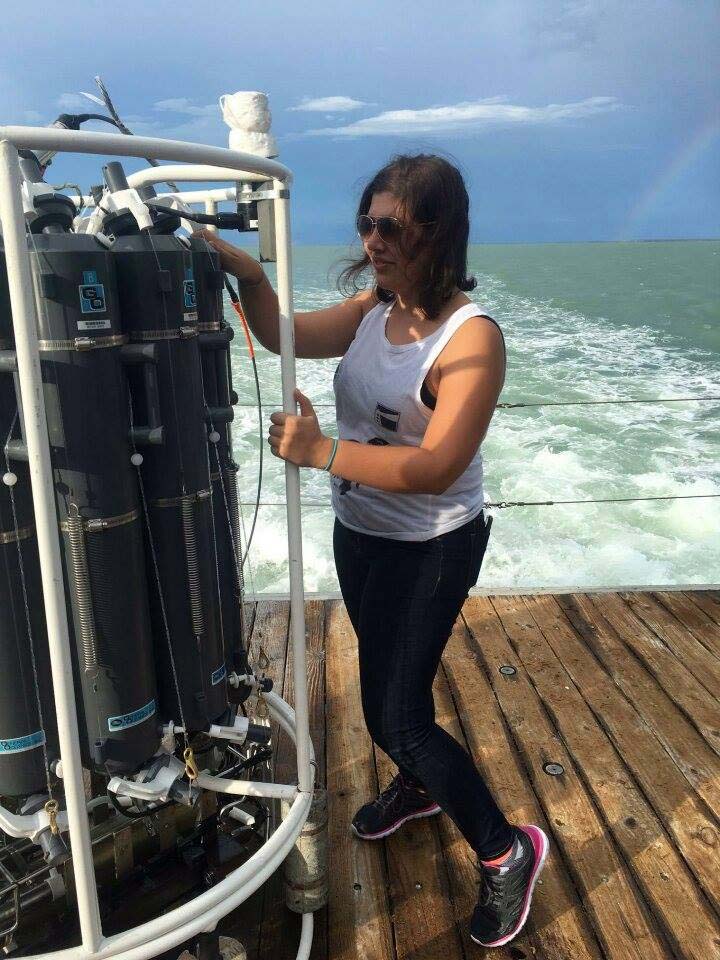 Natalie Sawaya in the field collecting samples of marine viruses.