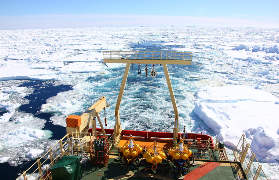 The RV Palmer transiting through sea ice near Totten Glacier, East Antarctica. Some regions of Antarctica are only accessible by a 12-day transit across the infamous Southern Ocean, where 30-foot swells are routine. Photo credit: Amelia Shevenell