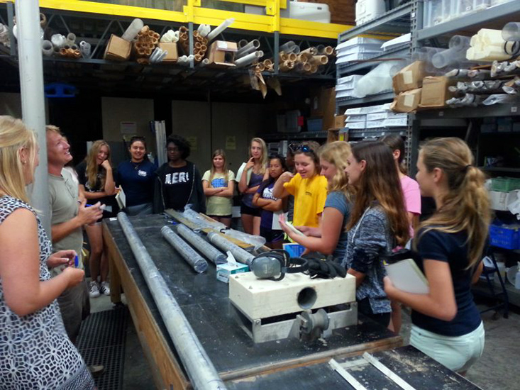 Nick at USGS shows campers the coring lab