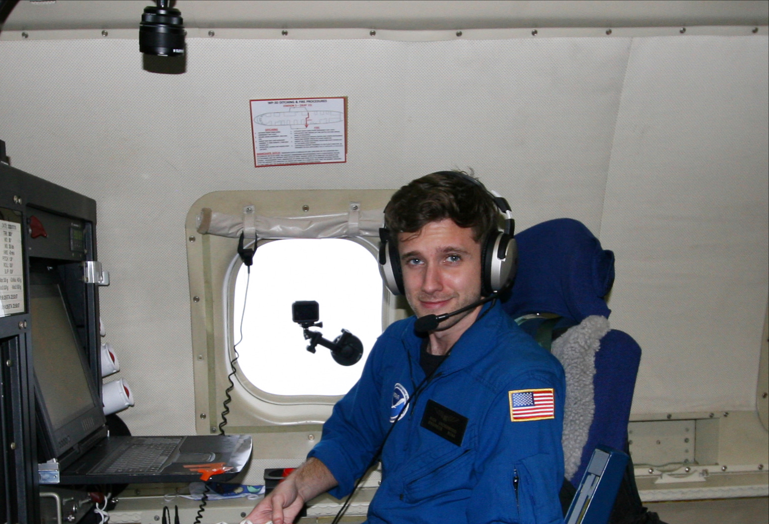 Nick Underwood aboard a NOAA Hurricane Hunters’s aircraft during Hurricane Laura in 2020. Hurricane Hunters penetrate storms to gather real-time data that informs forecasting. Credit: Mike Mascaro/NOAA