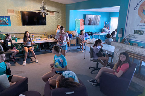 Campers taking a break for lunch at the Clam