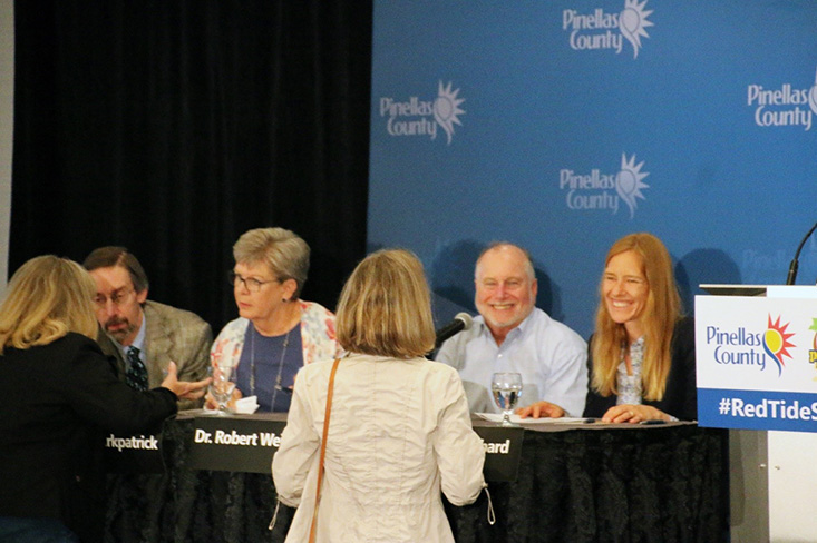 Panel scientists Dr. Richard Stumpf (NOAA), Dr. Barbara Kirkpatrick (GCOOS), Dr. Robert Weisberg (USF CMS), and Dr. Kate Hubbard (FWC FWRI) talk with audience members at the conclusion of the Red Tide Summit.