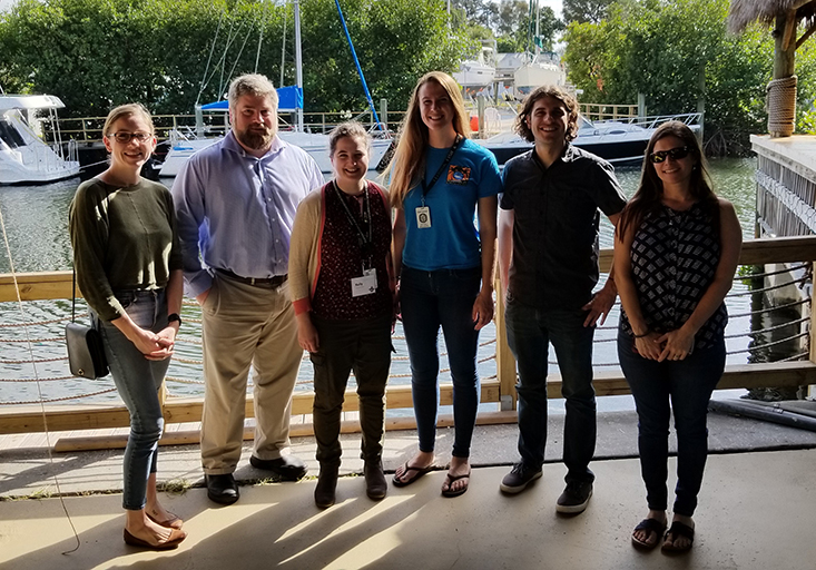 Past and current members of the lab managed by Cameron Ainsworth, PhD, one of the faculty who manage the Marine Resources Assessment (MRA) program. Michelle Masi is on the far right.