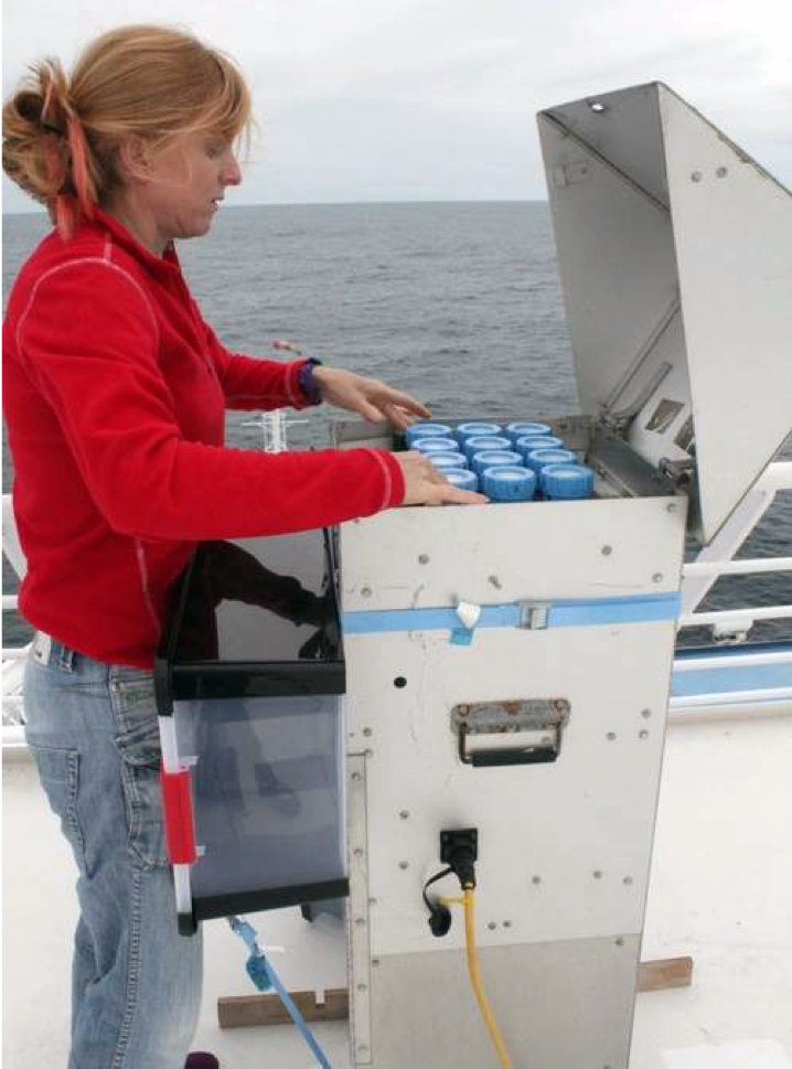 Dr. Rachel Shelley, a researcher at Florida State University and co-author of the Nature Communications study, sets up a dust collector used to capture aerosols on the R/V Knorr in 2010.