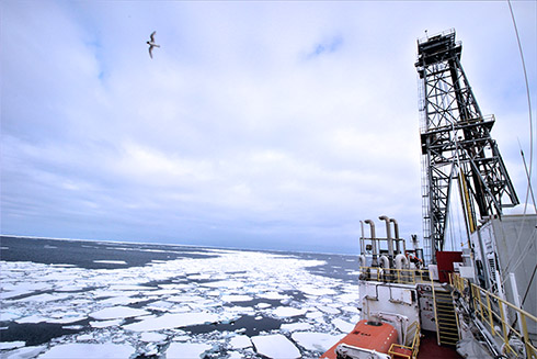 Research vessel JOIDES Resolution surrounded by sea ice as it approaches Antarctica's eastern Ross Sea. CREDIT, Jenny Gales, University of Plymouth.
