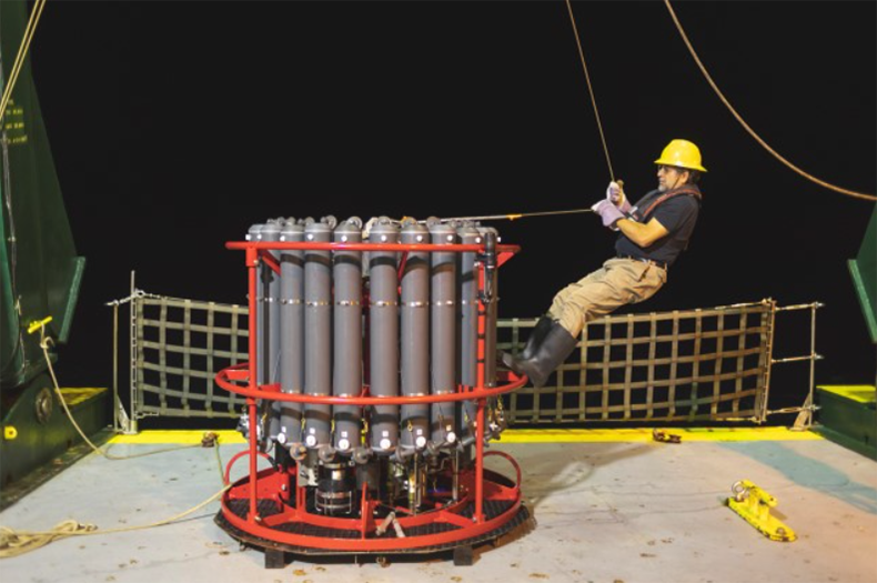 Researchers use rosette samplers, such as the one shown here, to sample deep water for trace minerals. Credit: Ryan Tabata.