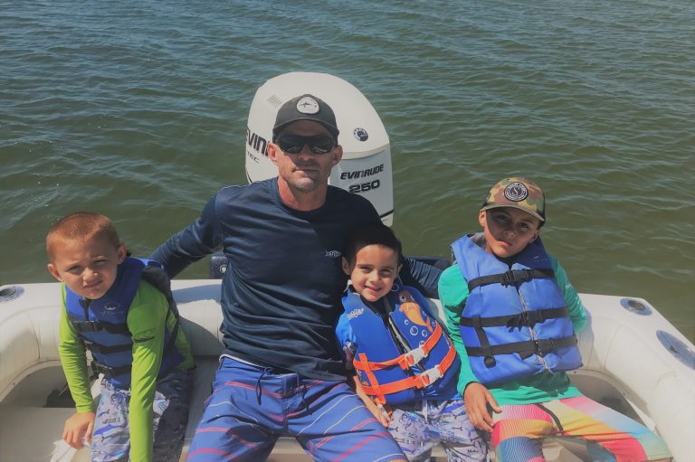 Shane Dunn enjoying time fishing with his three boys