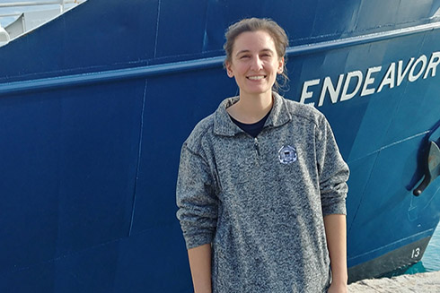 Shannon Burns prepares for field work aboard the R/V Endeavor.