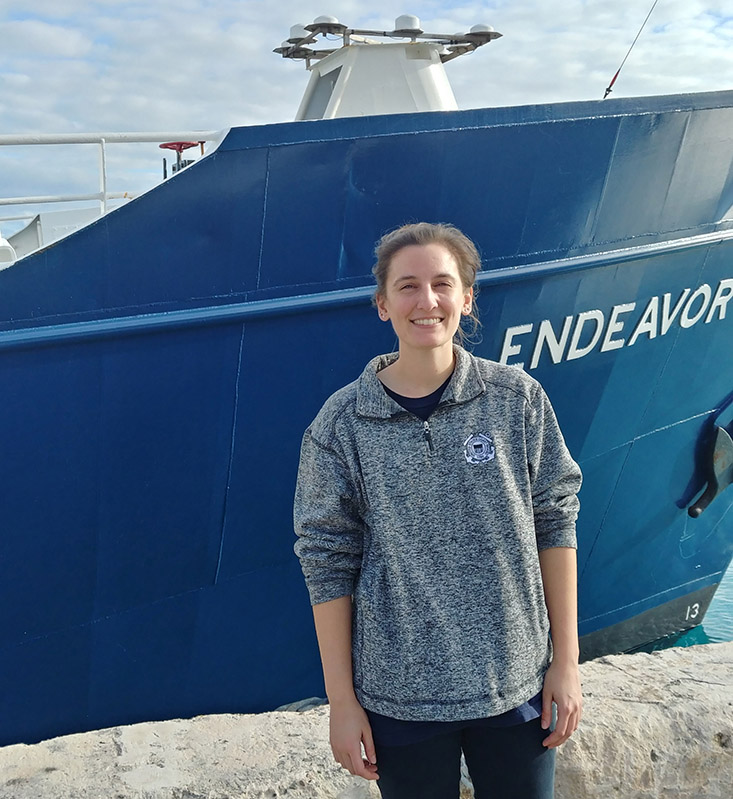 Shannon Burns prepares for field work aboard the R/V Endeavor. 