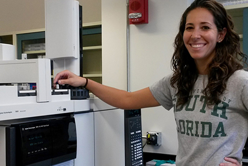 Susan Snyder, Ph.D. Candidate, operate a Gas Chromatography-Mass Spectrometry instrument at USF CMS. (Photo credit: C-IMAGE)