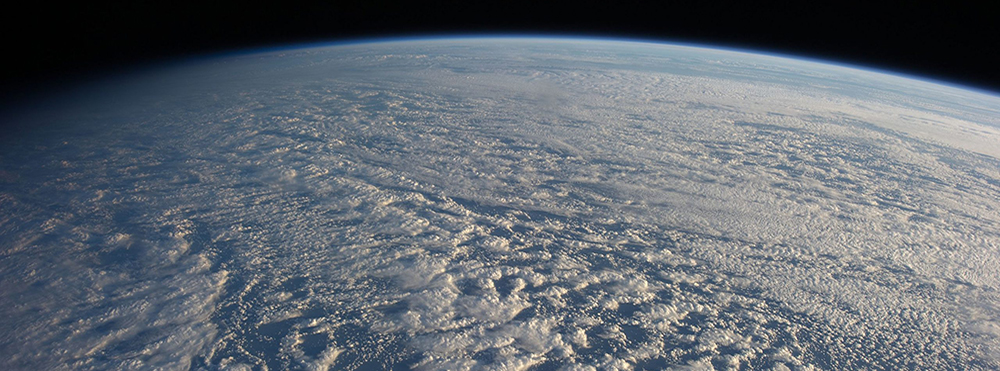 A new theory proposed by two scientists, called the Quasi-Normal Scale Elimination (QNSE) theory, holds great promise to revolutionize the physics behind turbulent flows in the atmosphere and ocean. This image was taken by crew members aboard the International Space Station when they flew above the northwestern Pacific Ocean. Credit: NASA 